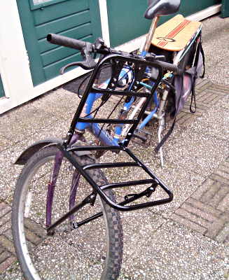 front rack installed on bike with xtracycle attachment