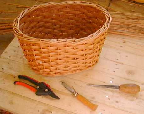Photograph showing lap board, snips, knife and bodkin